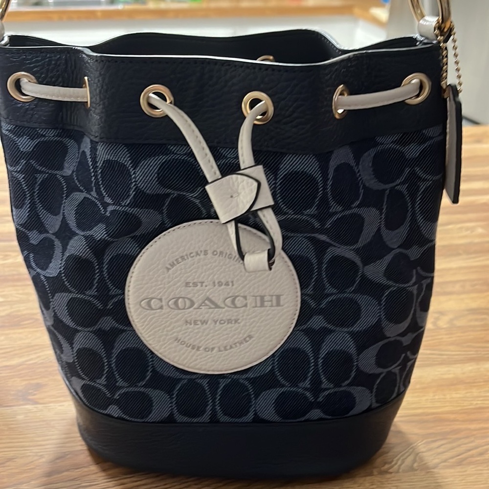 Beautiful Coach Dempsey drawstring bag